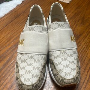 cream and brown slip on shoes. Worn a couple times per friendly home smoke free